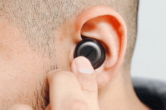 Gif of man putting the Jabra Elite 65t in ear.
